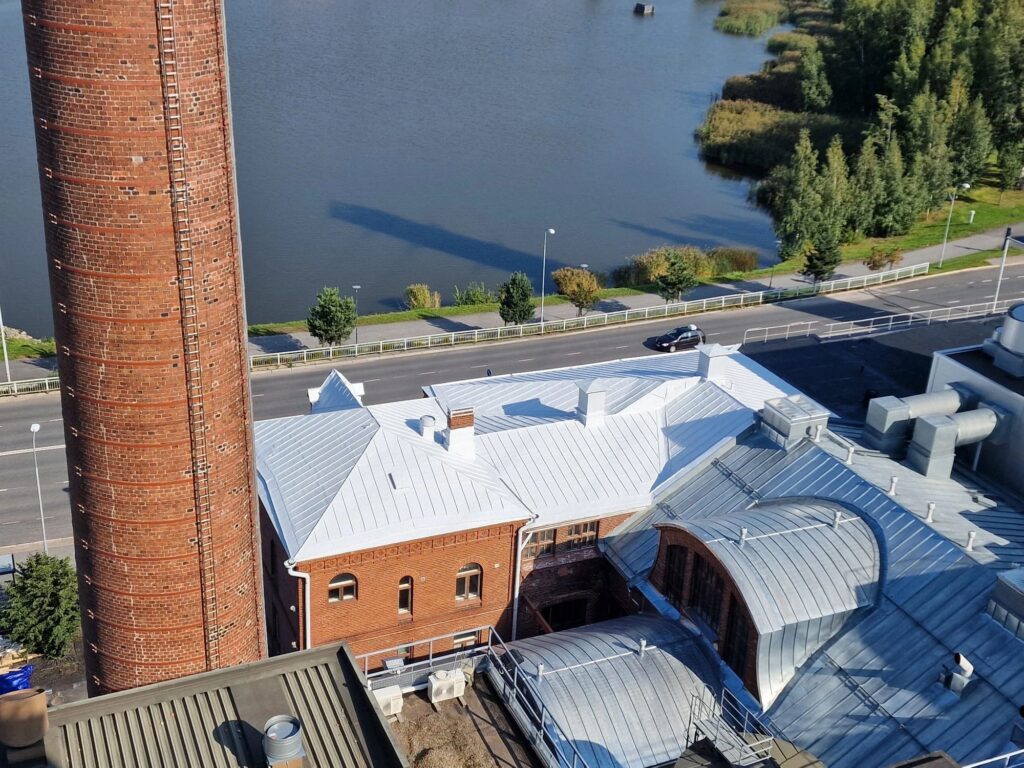 Coated metal roofs on historic brick buildings