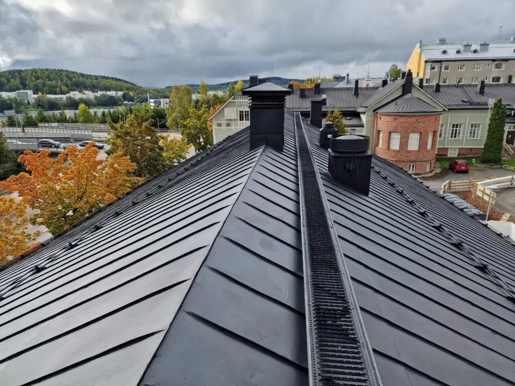 Pitched metal roof coated in black